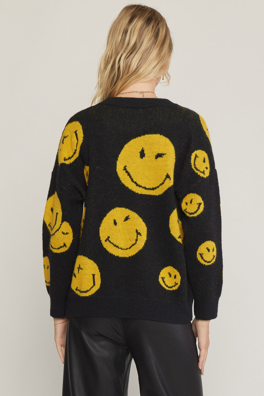 Black sweater sale with smiley faces